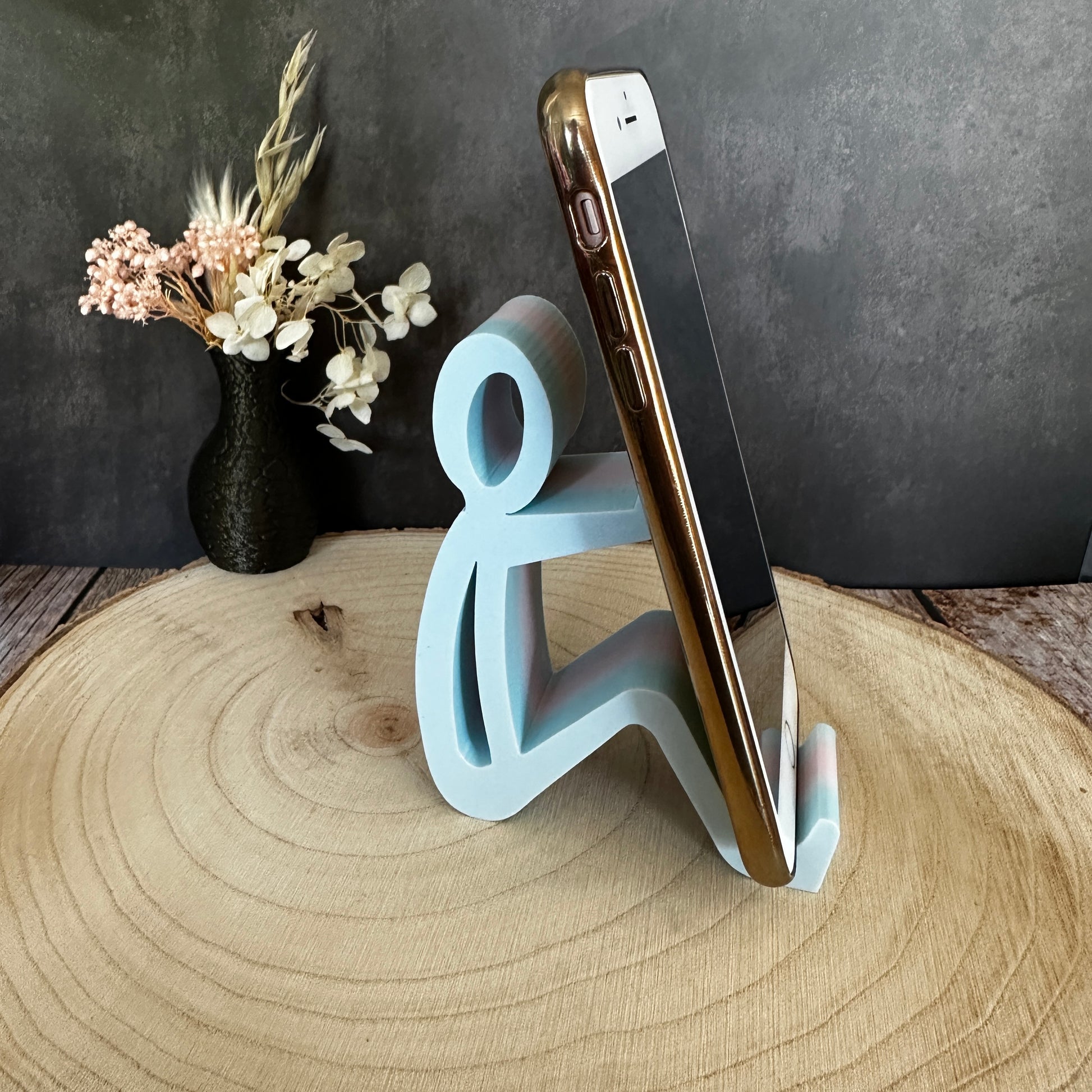 Telefoonhouder voor zittend gebruik – minimalistisch, kleurrijk en veelzijdig.