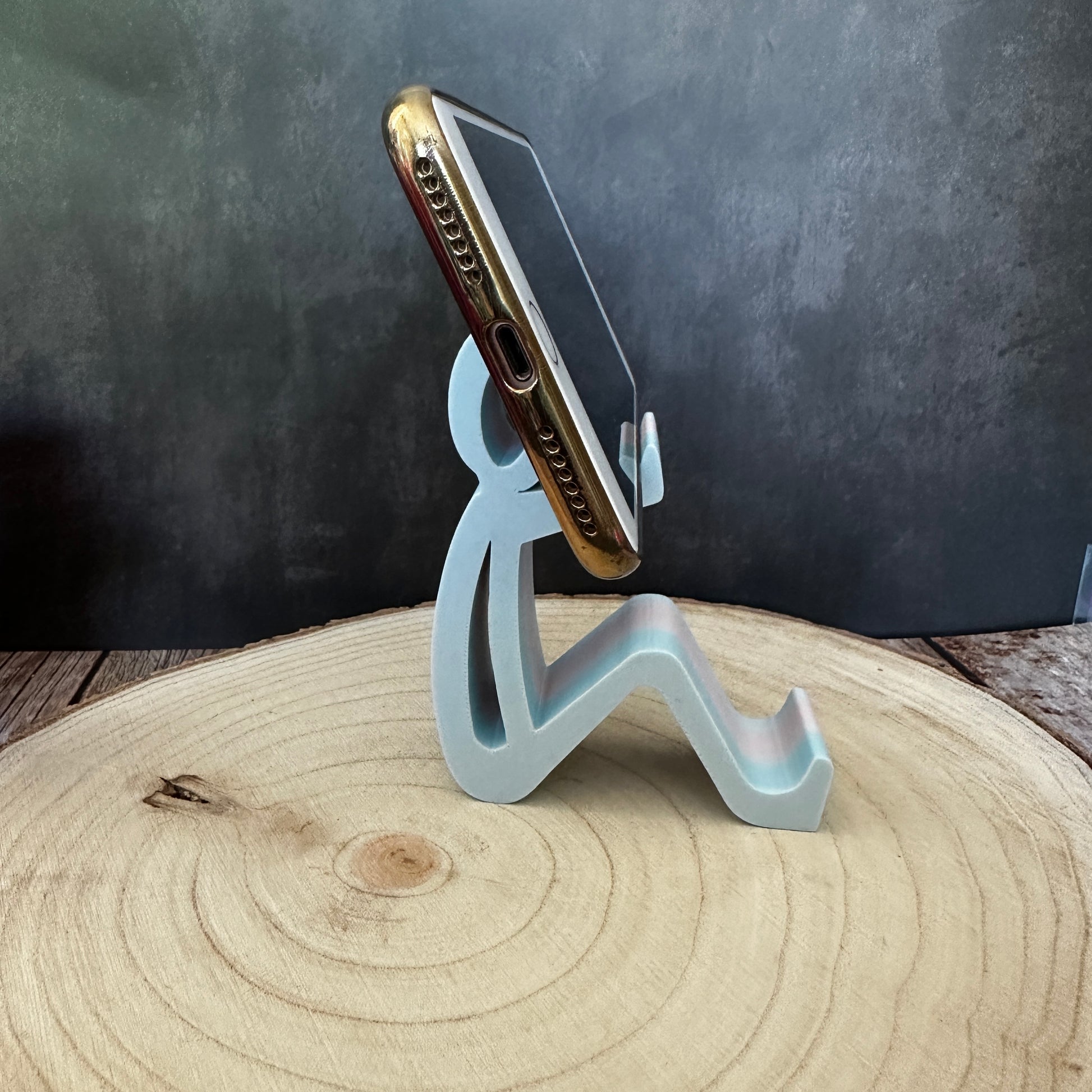 Telefoonhouder voor zittend gebruik – minimalistisch, kleurrijk en veelzijdig.