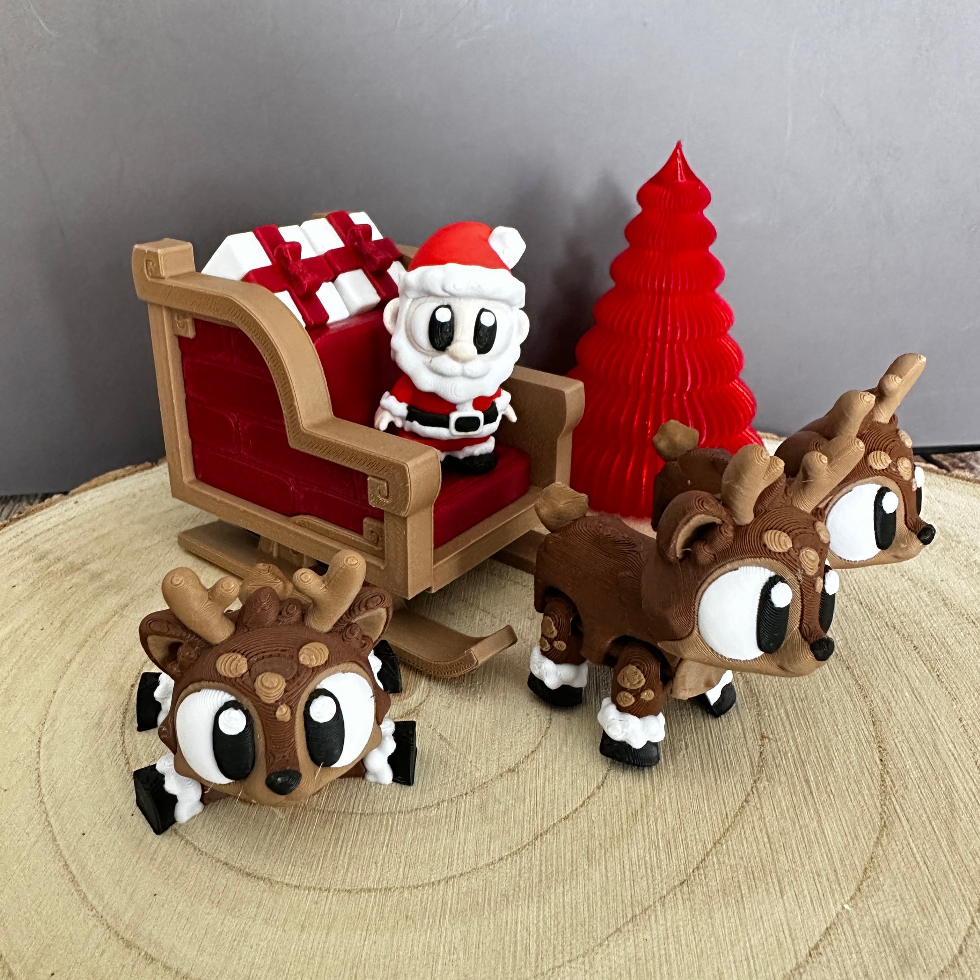 Complete kerstset met slee, kerstman en rendieren – feestelijke decoratie en een leuk cadeau-idee.