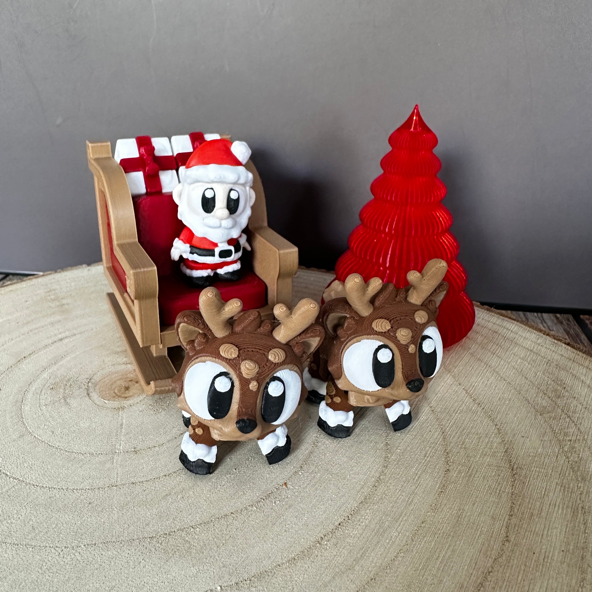Complete kerstset met slee, kerstman en rendieren – feestelijke decoratie en een leuk cadeau-idee.