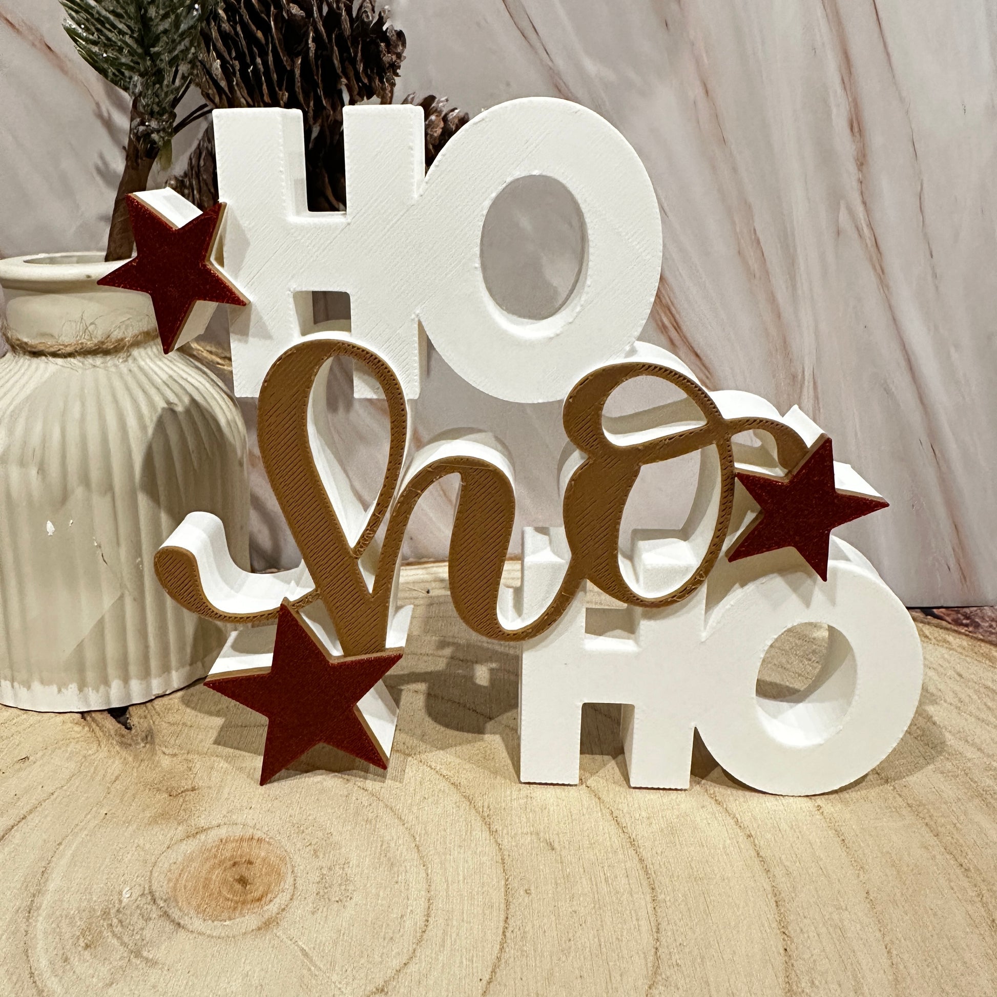 HO HO kerstdisplaystandaard – moderne kerstdecoratie met glittersterren in zwart of lichtbruin.