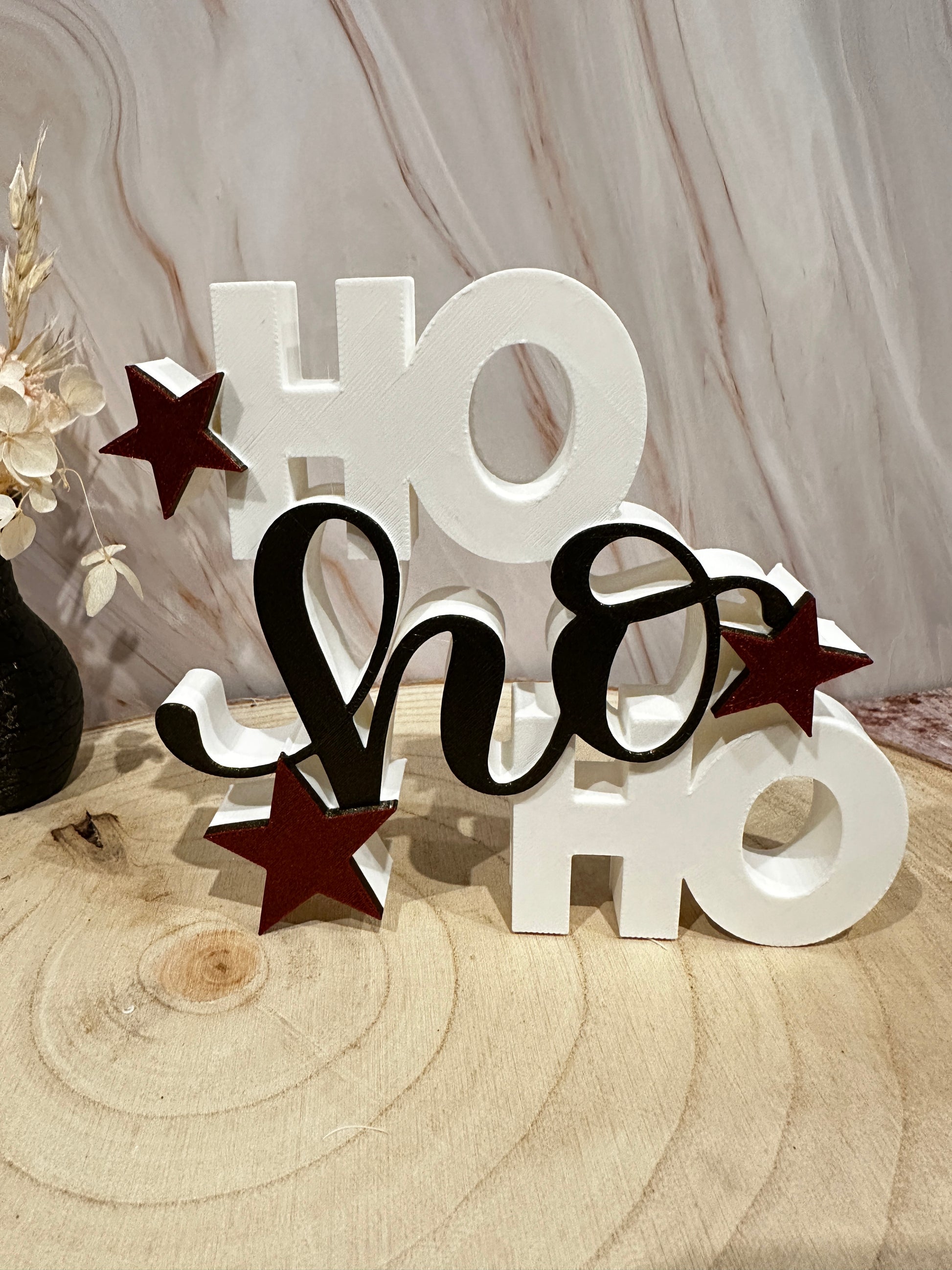 HO HO kerstdisplaystandaard – moderne kerstdecoratie met glittersterren in zwart of lichtbruin.
