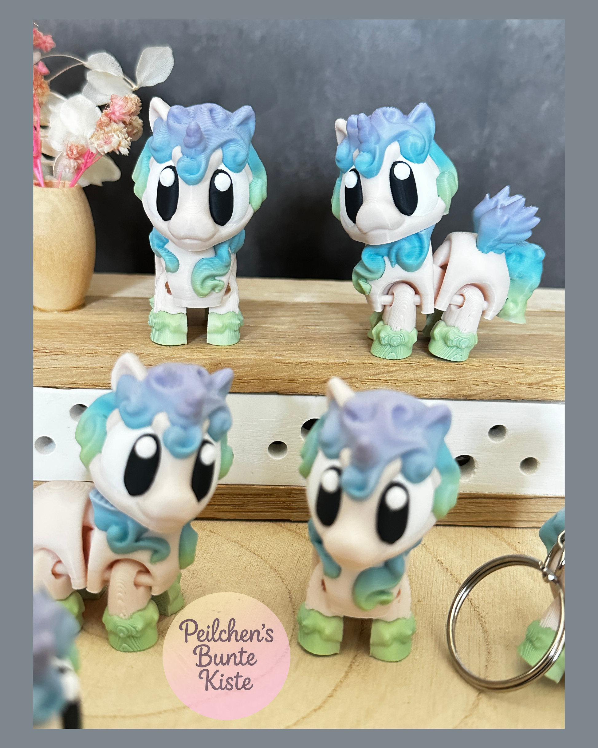 Süßes Einhorn in Regenbogenfarben – bewegliche Figur oder Schlüsselanhänger, mit oder ohne Flügel, Geschenkidee