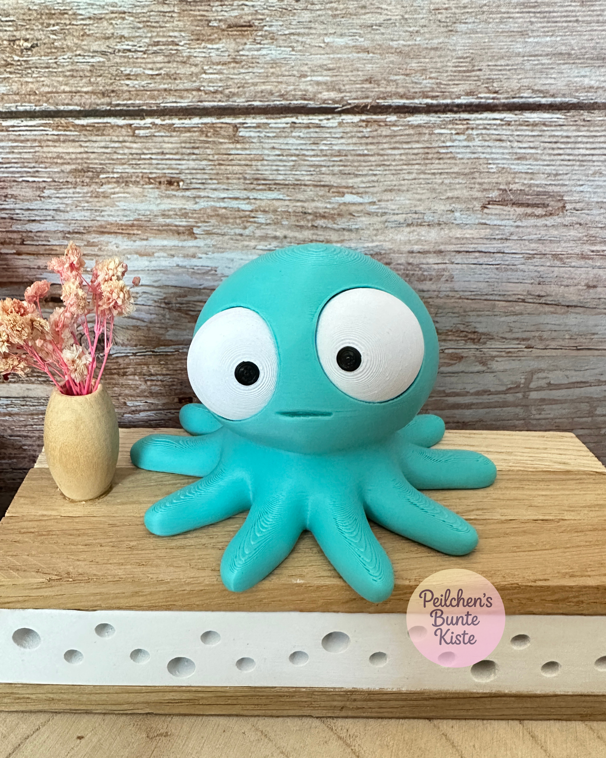 Oktopus mit beweglichen Augen – Lustige Dekofigur mit wechselnden Gesichtsausdrücken
